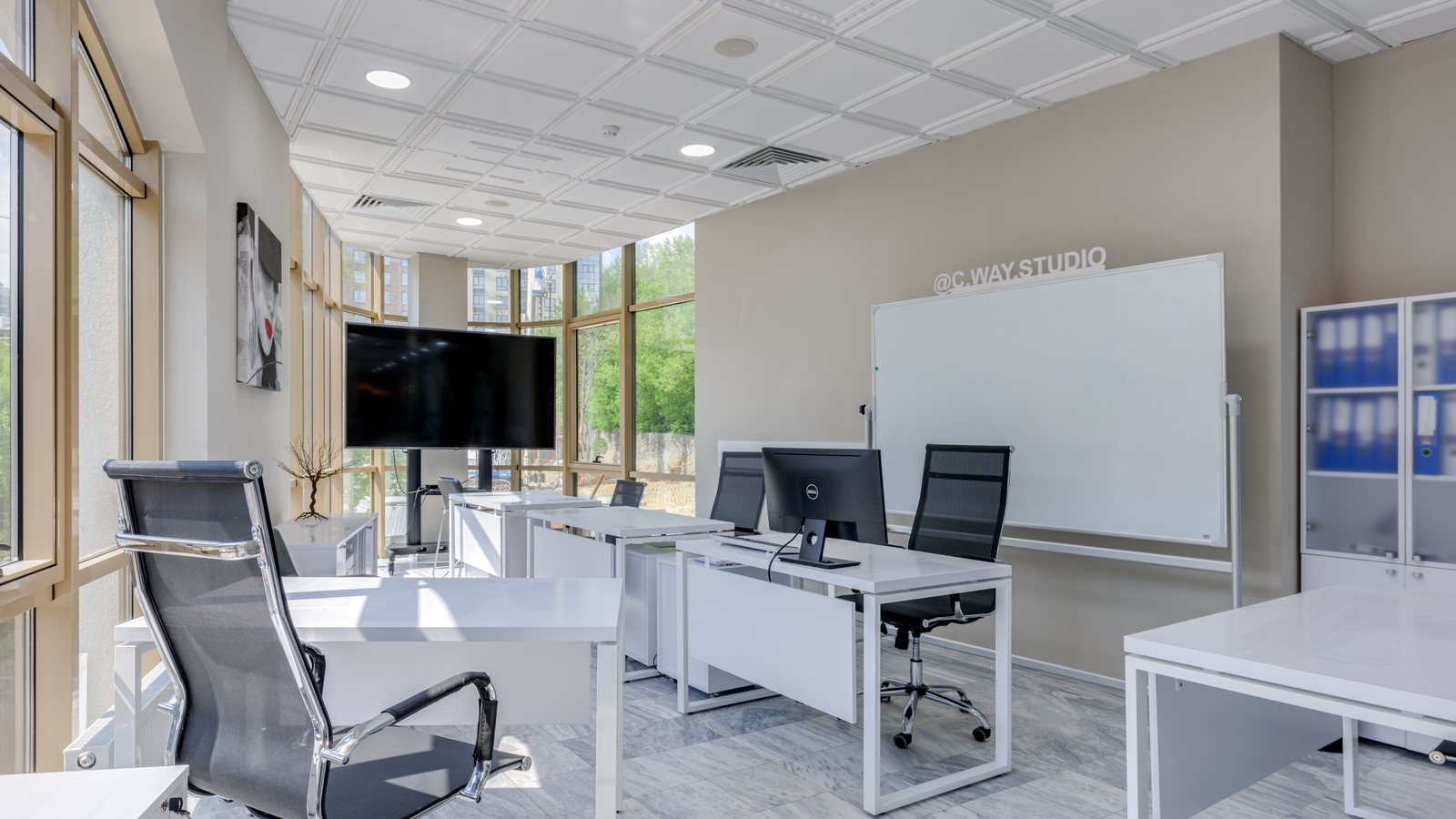 A modern office setting suggesting a corporate group structure in Italy