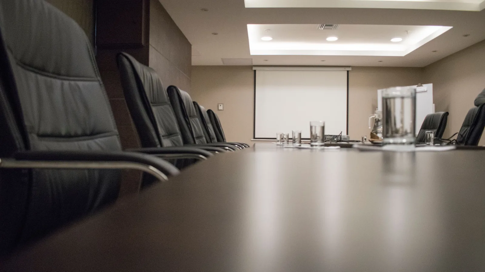 An empty meeting room of the kind where a transfer of quotas is signed